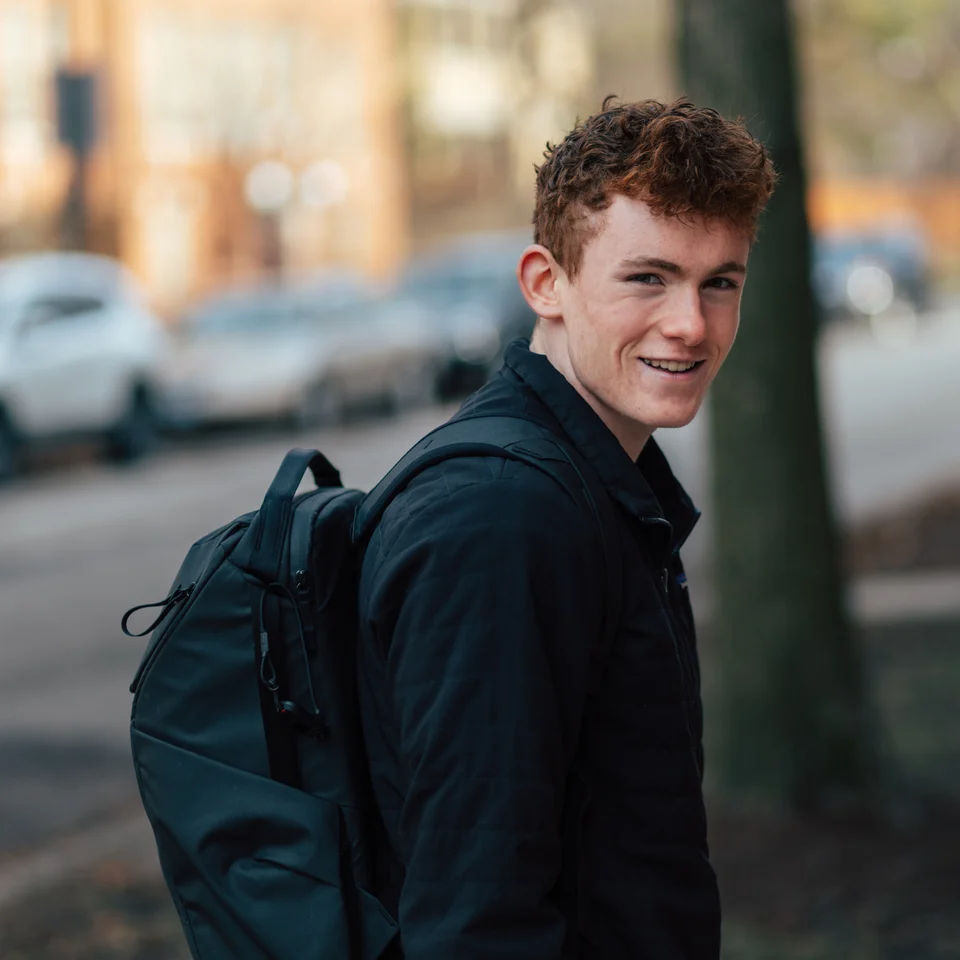 Ryan McComb on a tree-lined street